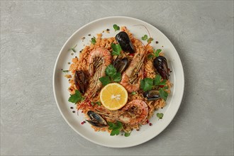 Seafood paella, shrimp and mussels risotto, rice, homemade, top view, no people