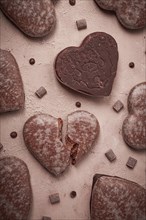 Food wallpaper, chocolate glazed gingerbread, heart-shaped, top view, no people