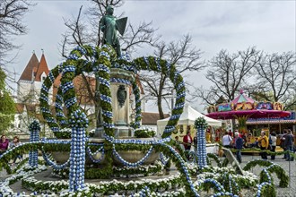 Hand-painted Easter eggs, decorated Easter fountain, Ludwigsbrunnen with statue of Emperor Ludwig