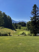 Golf Course with Mountain View in a Sunny Summer Day in Burgenstock, Nidwalden, Switzerland, Europe