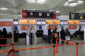 EasyJet check-in bag drop area, Stansted airport, Essex, England, UK