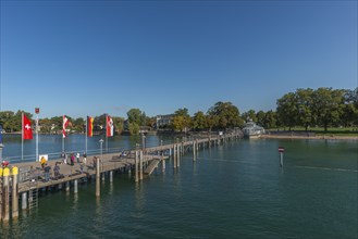 Nonnenhorn on Lake Constance, jetty, marina, townscape, flags, blue sky, Bavaria, Germany, Europe