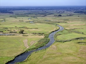 The meandering Biebrza River in the Biebrza National Park in northern Poland. Goniadz, Podlasie,