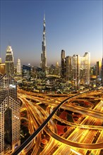 Burj Khalifa skyline tallest building in the world from above at night in Dubai, United Arab