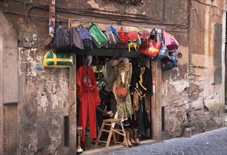 Small second hand shop in a side alleyway, Campo de Fiori, Rome. Italy