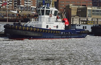 Europe, Germany, Hamburg, St, Pauli, Harbour tugboat at the pier in the drift ice, Hamburg,