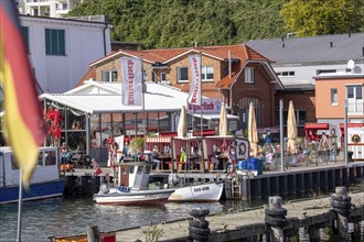 The town harbour of Sassnitz, island of Rügen, fishing boats, restaurants Mecklenburg-Vorpommern,