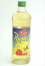 Rapeseed oil in a commercial bottle, rapeseed, food, plant, Brassica campestris, Brassica napus,