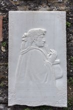 Memorial plaque with a relief of the Italian poet and historian Francesco Petrarca, 1304 -1374, on