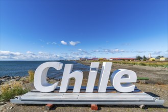 Huge letters form the word Chile on the beach of the Strait of Magellan, Nao Victoria Museum, city