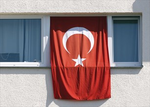 A Turkish flag hangs from the window of a house in Berlin, 01 06 2023