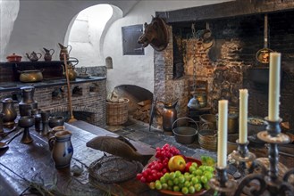 Kasteel van Laarne, interior showing kitchen and open fireplace inside 14th century medieval moated