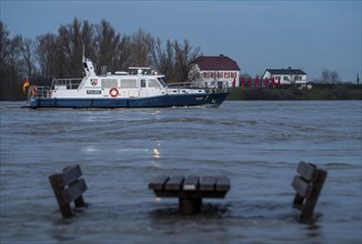 High water on the Rhine, Lower Rhine, here near Xanten, at Bislicher Insel, patrol boat of the