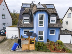 Detached house with various solar modules, in addition to normal standard solar panels, PV tube