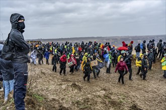 Many thousands of demonstrators march after a demonstration against the demolition of the lignite