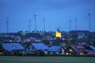 Wind farm above the village of Lichtenau, self-proclaimed energy town, houses with photovoltaic