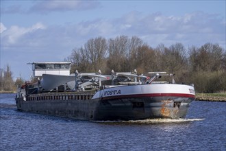 Transport of rotors, blades for wind turbines, by barge on canals in the Netherlands, near