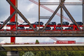 The Beeckerwerther Rhine bridge of the A42 motorway, truck traffic, in front of it the Haus-Knipp