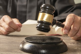 Close-up of a judge's gavel as a symbolic image for a court judgement