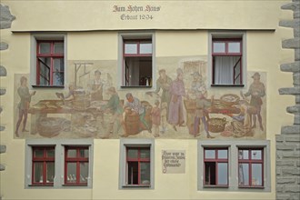 Historical mural with fish market scene, medieval building, inscription, year, market, market