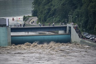 Weir of the Lake Baldeney in Essen, the masses of water roar through the open weirs, high water on