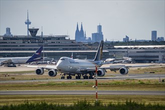 Cologne-Bonn Airport, CGN, UPS cargo aircraft, Boeing 747 jumbo jet, on landing, tower at the