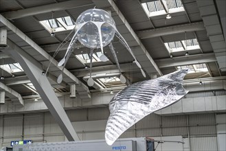 Mechanical flying objects, filled with helium, controlled by fine mechanics, movements copied from