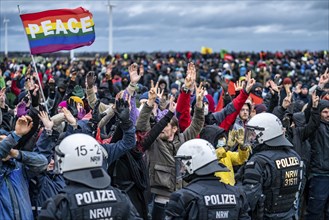 Violent clashes between thousands of demonstrators and the police, after a demonstration against