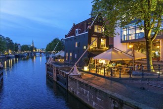 Sint Antoniesluis, on the Oudeschans canal, canal cruise boat, café, De Sluyswacht, Amsterdam,