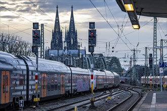 RRX train on the track in front of Cologne Central Station, Hohenzollern Bridge, Cologne Cathedral,