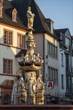 Main Market Square, Market Fountain, St Peter's Fountain, in Trier, Rhineland-Palatinate, Germany,