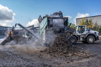 Composting plant, organic waste is composted, sorted by size, smaller parts are reused as compost,