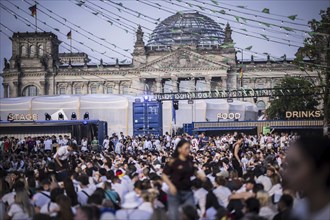 Scenes in the fan zone on Platz der Republik in front of the Reichstag building taken in Berlin, 29