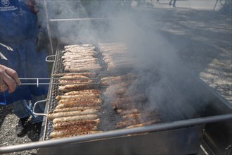 Roast sausages on a charcoal grill, church fair in Franconia, Bavaria, Germany, Europe