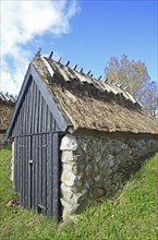 Old thatched fishing hut in Knäbäckshusen, a small fishing village near Rörum, Simrishamn