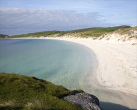 Sandy beach and aquamarine sea at Vatersay Bay, Barra, Outer Hebrides, Scotland, UK