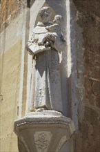 Historic religious statue Franciscan Church of St Mary of Jesus, Valletta, Malta, Europe