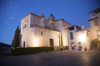 Night time illuminated view of the Church of Santa Maria de Alhambra, the Alhambra complex,