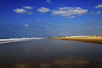 Wave breaking on sandy beach at Conil de la Frontera, Cadiz Province, Spain, Europe