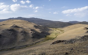 Small stream between mountainous hills, Song Kul, Naryn region, Kyrgyzstan, Asia