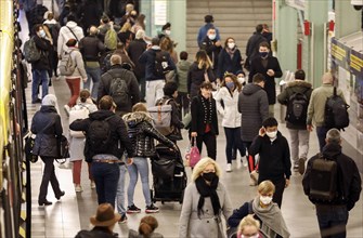 Berlin Alexanderplatz underground station, passengers with masks, 19 October 2020