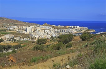 Apartment housing property development at coastal resort, Marsalforn, island of Gozo, Malta, Europe