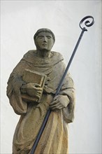 Sculpture and monument to monk Sanctus Bernardus, Bernhard von Clairvaux, with crosier, saint,