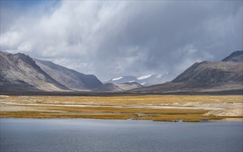 Mountain lake in the high mountains, Ak Shyrak Mountains, near Kumtor, Kara-Say, Tian Shan,