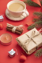 Christmas or New Year composition. Decorations, box, cinnamon, fir and spruce branches, cup of