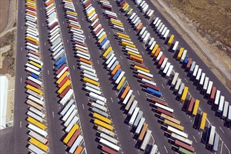 Truck trailers and truck containers standing in a car park at the Giga Factory, Gruenheide, 14.08