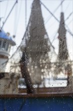 View through a window with raindrops on a shrimp boat, Oudeschild, Texel, West Frisian Islands,