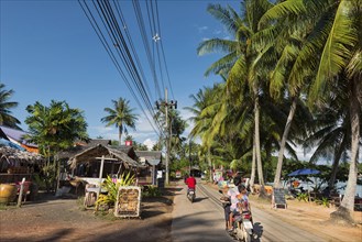 Left-hand traffic on the Thai holiday island of Koh Yai Noi, traffic, motorbike, holiday, travel,