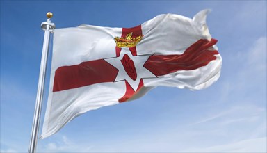 The flag of Northern Ireland flutters in the wind