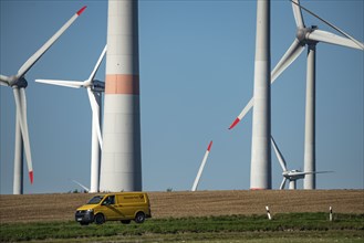 Wind farm near Lichtenau, wind turbines, country road, Driburger Straße, Deutsche Post vehicle,